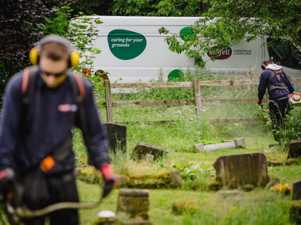 Scofell teams working along side each other to maintain cemetery